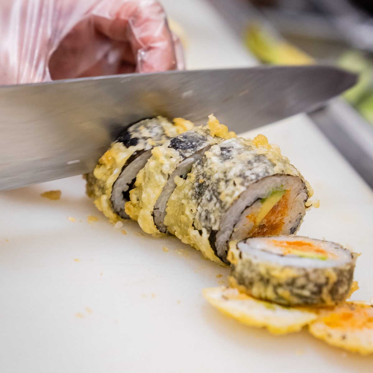 Sushi being cut